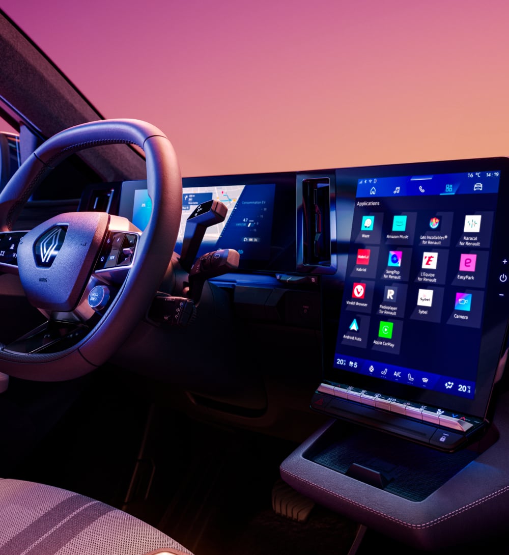 Close up interior view of Renault Scenic steering wheel and digital screen