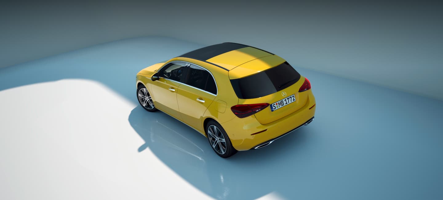Rear Angled shot of yellow Mercedes-Benz A-Class Hatchback